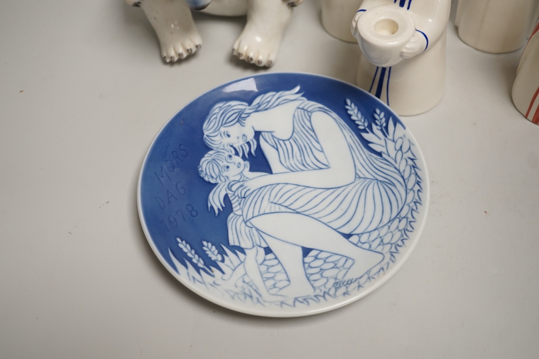 A group of Royal Copenhagen porcelain figural candle holders, a vase, the figure of a polar bear cub and a Mother’s Day dish
